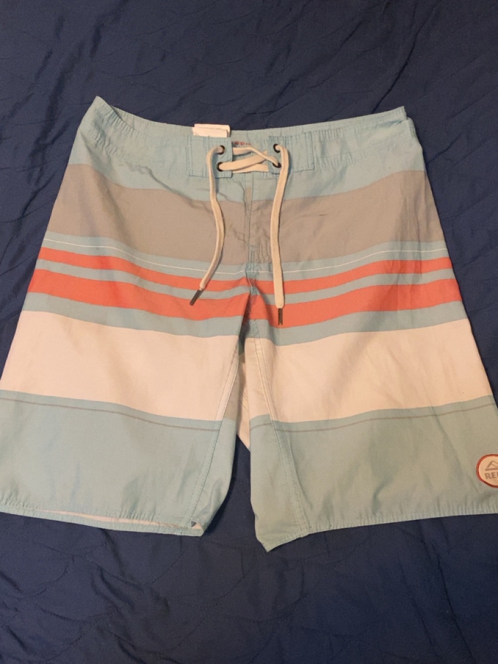 Reef Men’s Light Blue, White & Coral Stripe Swim Trunks